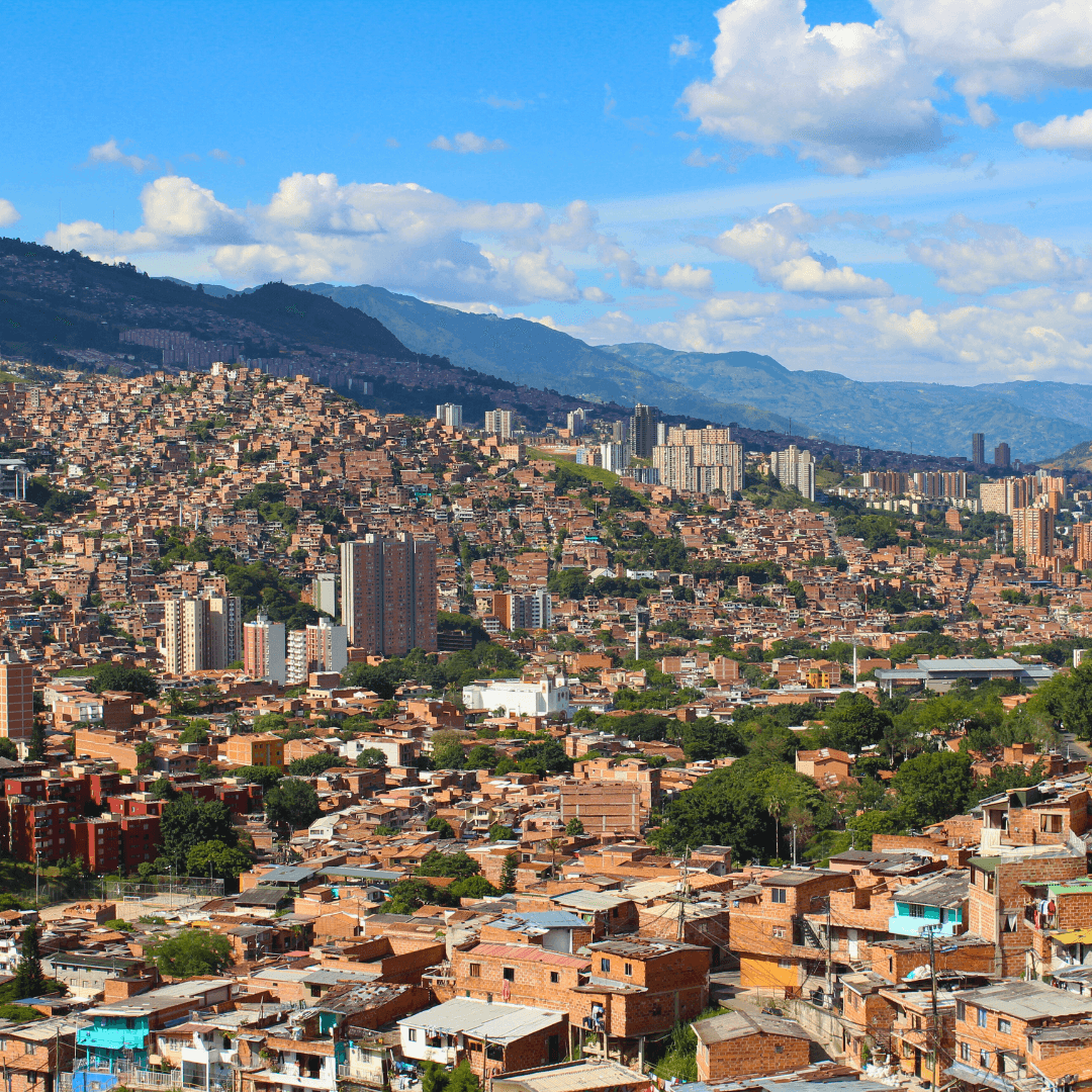 A panoramic view of Medellin's cityscape from the hills – featured in our Medellin Travel Blog.