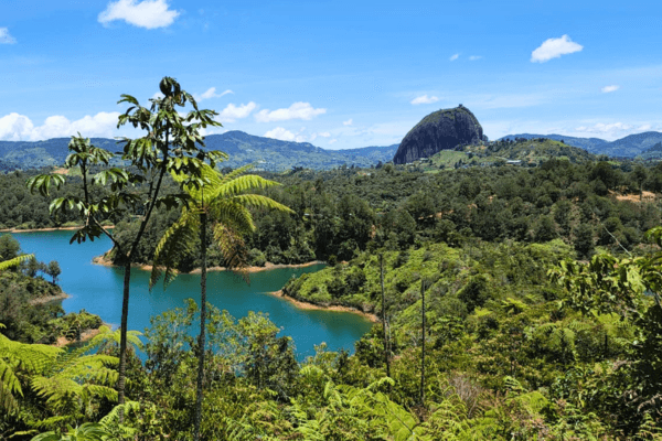 Scenic view of El Peñol rock and Guatape lake on a day trip from Medellin.