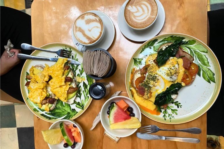 Colombian brunch with eggs, fruit, and coffee in Medellin