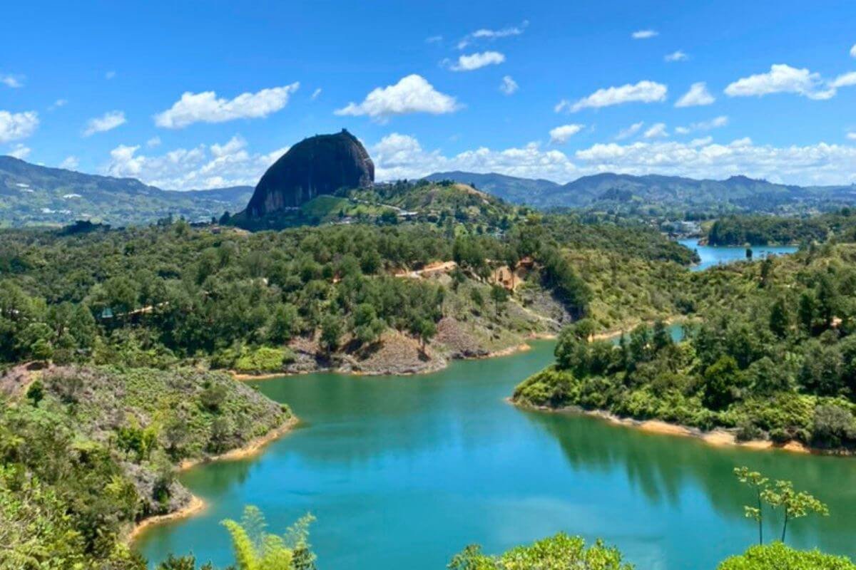 View of El Peñol rock and lakes during a Guatape day trip from Medellin
